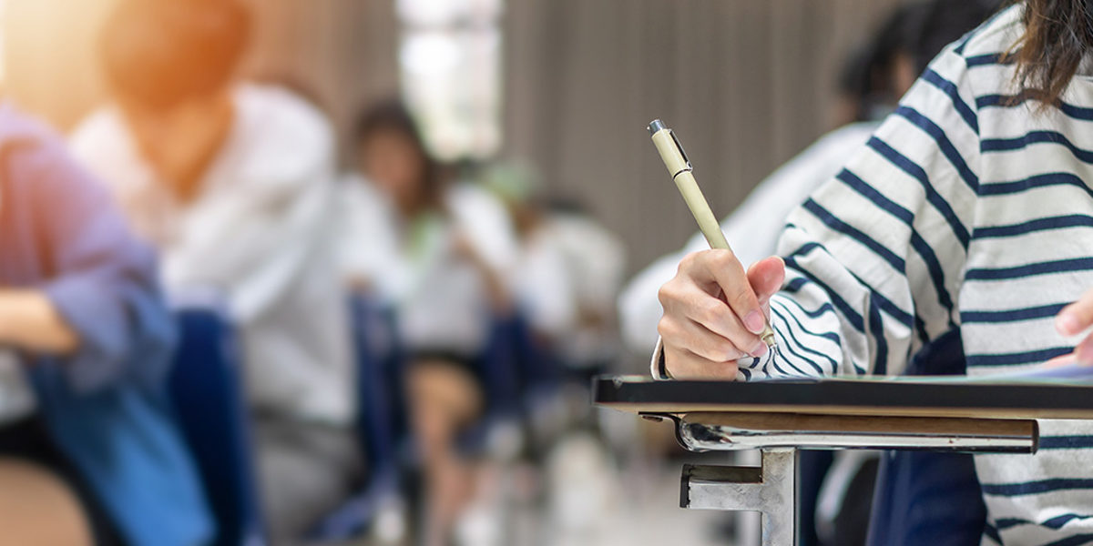 Exam at school with student's taking educational admission test in class, thinking hard, writing answer in university classroom, education and world literacy day concept Schlagwort(e): exam, student, school, test, classroom, education, admission, teacher, scholarship, university, stress, college, course, assessment, day, paper, literacy, business, degree, application, registration, training, back, people, letter, world, accessibility, applicant, apply, concentration, evaluation, examination, hand, group, international, knowledge, learning, lecture, month, national, note, opportunity, pass, read, register, result, studying, teaching, workshop, writing